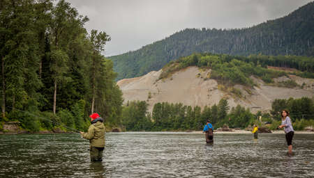 Combat fishing for salmon on the Kitimat River, on a summer morning in British Columbia, Canadaのeditorial素材