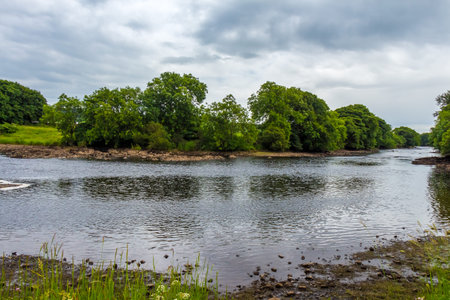Low flow at the Graveyard Pool on the River Dee in Summer at Barstibly near Kirkcudbright, Galloway,...