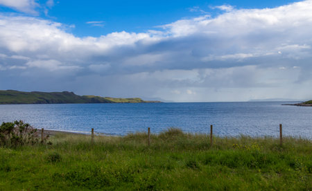The shoreline at Loch Brittle, from Glen Brittle Caravan Site, on a cloudy summers evening on the...
