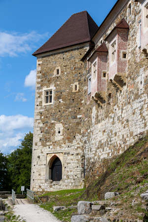 The outer wall and watch tower on Ljubljana Castle / Ljubljanski grad, Ljubljana, Sloveniaのeditorial素材