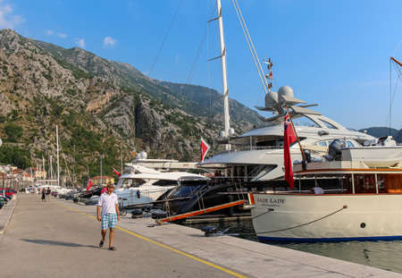 Luxury yachts moored at the harbour in the Old Town of Kotor, Montenegroのeditorial素材