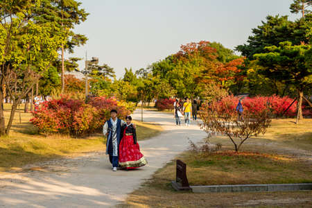 Seoul, South Korea - October 19th 2017: A couple in traditional Korean hanbok dress at Gyeongbokgung Palace, Seoul, South Koreaのeditorial素材