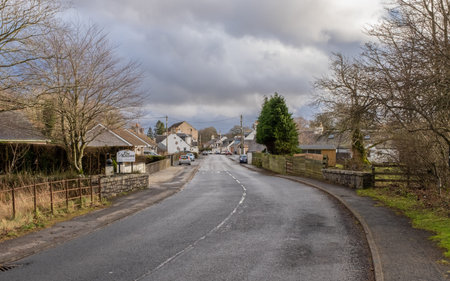 Carsphairn, Scotland - January 2nd 2022: The A713 road leading into the village of Carsphairn,...