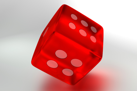 Red rolling dice on white backgroundの写真素材