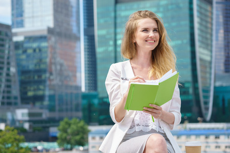 City business woman working taking notes outdoor.の写真素材