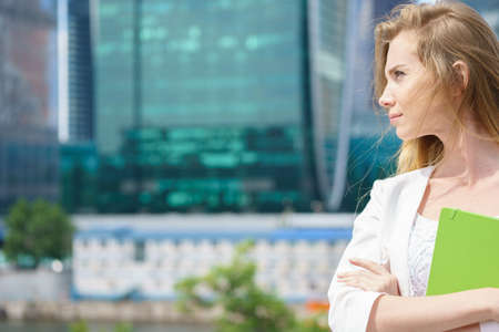 Portrait of smiling beautiful business girl smiling at camera.の写真素材