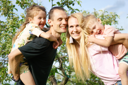 Outdoor portrait of big happy family smilingの写真素材