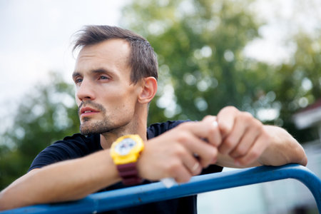 Outdoors portrait of pensive man looking into distance