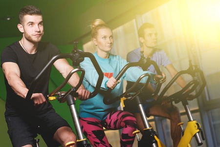 Fitness center with training athletesの写真素材