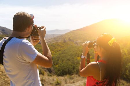 Girl , guy , pictures of mountain,の写真素材