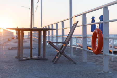 Sea shore with life buoyの写真素材