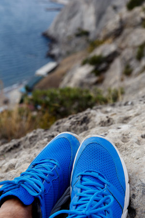 Man in shoes among mountain
