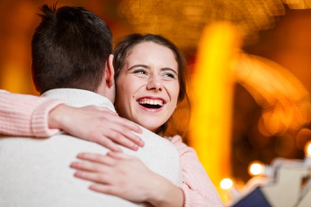 Beautiful pair hugging at hallの写真素材