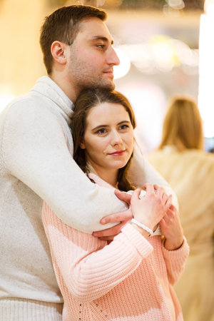 Lovers guy with girl cuddlingの写真素材