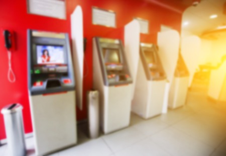 Several red ATM with telephoneの写真素材