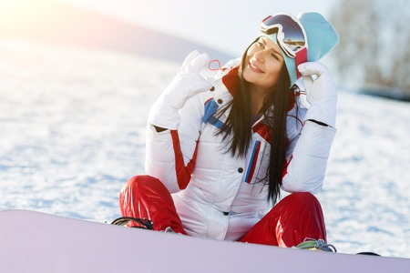 Weekend of girl with snowboardの写真素材