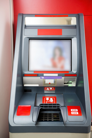 Photography of red cash dispenserの写真素材