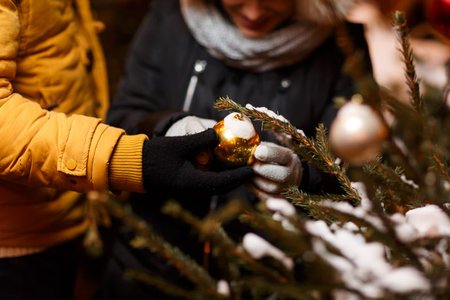 Loving couple at decorated tree