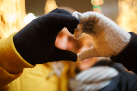 Heart from hands loving coupleの写真素材