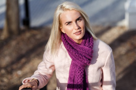 Portrait of blonde in coatの写真素材