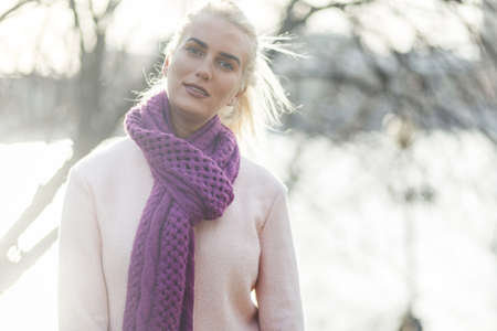 Beautiful girl with purple scarfの写真素材