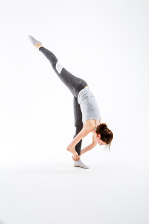 Young woman exercising on stretchingの写真素材