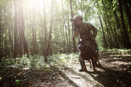 Picture of military man with dogの写真素材