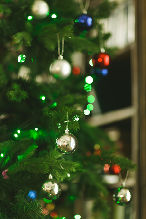 Image of decorated Christmas tree with balls and beadsの写真素材