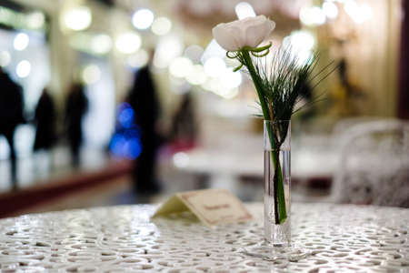 Photo of table, vase with flowerの写真素材