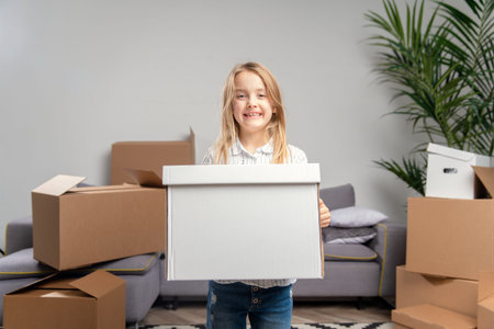 Image of girl with cardboard box in her hands