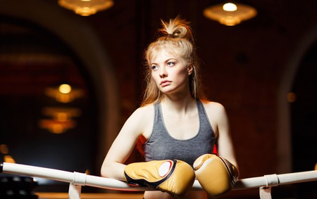 Boxer woman in boxing gloves in ring .の写真素材