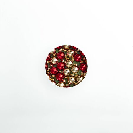 Christmas minimal concept -christmas circle made from red and yellow balls. Merry christmas (xmas) background. Flat lay new year minimal. Abstract creative pattern. Fashion xmas.の写真素材