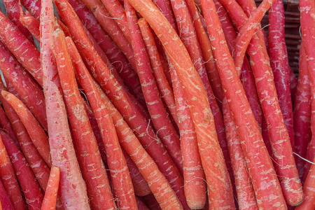 The Close up of red carrot bunchの写真素材