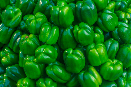 The close up of fresh green Capsicum Backgroundの写真素材