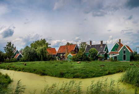 Zaanse Schans, Holland - August 26, 2018 : Traditional Dutch house in Zaanse Schans. The Zaanse Schans is a typically Dutch small village in Amsterdam, Netherlands.のeditorial素材