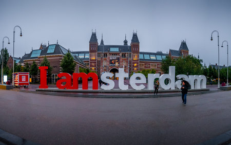 Amsterdam, Netherlands - August 26, 2018: Unidentified Tourist at the red and white I am Amsterdam sign in centre of amsterdamのeditorial素材