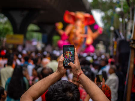 Mumbai, India - September 12,2019 : Thousands of devotees bid adieu to Lord Ganesha in Mumbai during Ganesh Visarjan which marks the end of the ten-day-long Ganesh Chaturthi festival.のeditorial素材