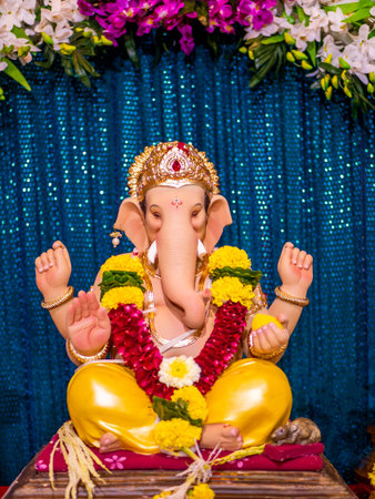 Beautiful Statue of Lord Ganesha with blue Bokeh background