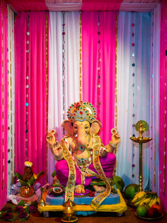 Closed up of Lord Ganesha with white and ping backgroundの写真素材