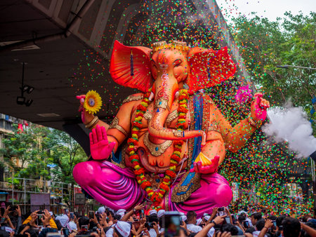 Mumbai, India - September 12,2019 : Thousands of devotees bid adieu to tallest Lord Ganesha in...