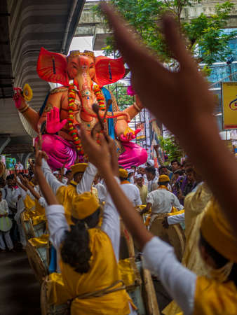 Mumbai, India - September 12,2019 : Traditional band participating along with thousands of devotees to bid adieu to Lord Ganesha in Mumbai during Ganesh Visarjan.のeditorial素材