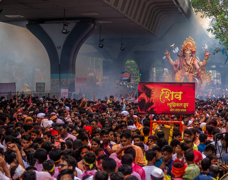 Mumbai, India - September 12,2019 : Thousands of devotees bid adieu to tallest Lord Ganesha in...