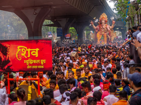 Mumbai, India - September 12,2019 : Thousands of devotees bid adieu to tallest Lord Ganesha in...