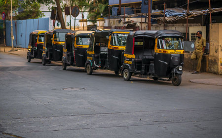 Thane, India, December 22,2020 :  Auto rickshaw Standing on the streets of Thane city.のeditorial素材