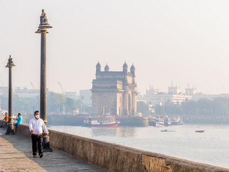 Mumbai, India - January 7, 2021: Unidentified manÂ wearing a face mask