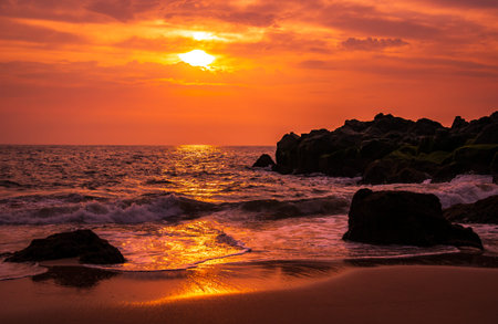 Beautiful sunset or sunrise with colorful sky at devghali or Kasheli beach, a hidden travel...
