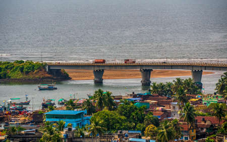 RATNAGIRI, INDIA - November 19, 2021 : Panoramic view of Bhatia bridge, and Arabian sea from Thibaw point. Tourist attraction at sunset.のeditorial素材