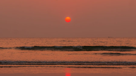 Beautiful sunset at sea shore of Coastal Maharashtraの写真素材