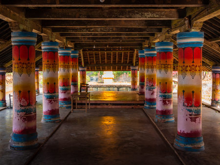 Malvan, INDIA - December 19, 2021 : Beautifully painted pillars of Bhagavati temple at Coastal...