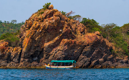 Malvan, INDIA - December 23, 2021 : Unidentified tourists enjoying boat ride in  Devbagh beach, Sindhudurga, a place listed in 30 favorite tourist destination around worldのeditorial素材